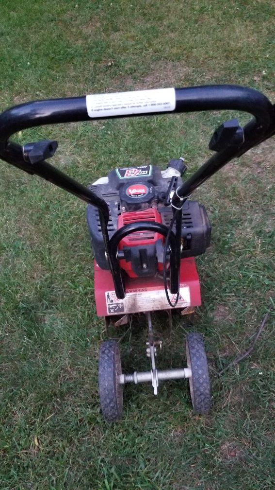 Earthquake mc43 mini cultivator tiller rototiller 43cc in working