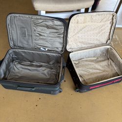2 Carry-On Size Suitcases