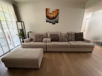 Two seat and one seat couch and ottoman