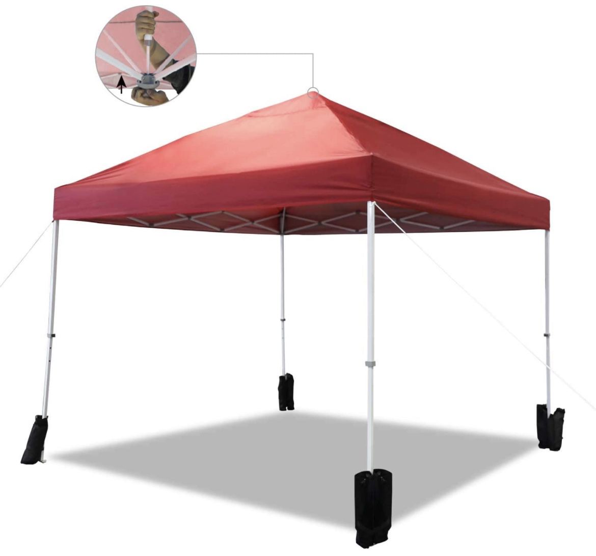 Amazon Basics Outdoor One-push Pop Up Canopy, 10ft x 10ft with Wheeled Carry, 4-pk weight bag, Red