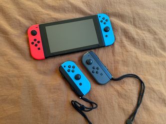 Nintendo Switch + Dock and extra JoyCons