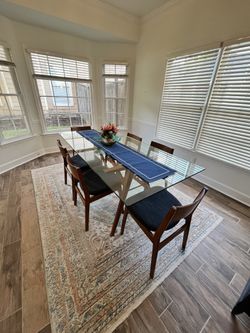 West Elm Mid Century modern Glass And Wood Table And Navy Chairs