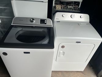 Top load washer dryer