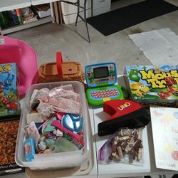Storage box full of toys and games