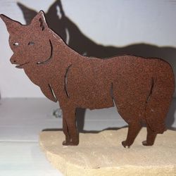 Metal Wolf Figurine On A Large Rock Base