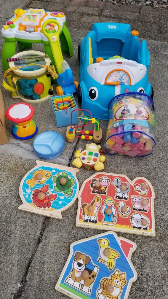 A lot of infant, baby, and toddler toys & such
