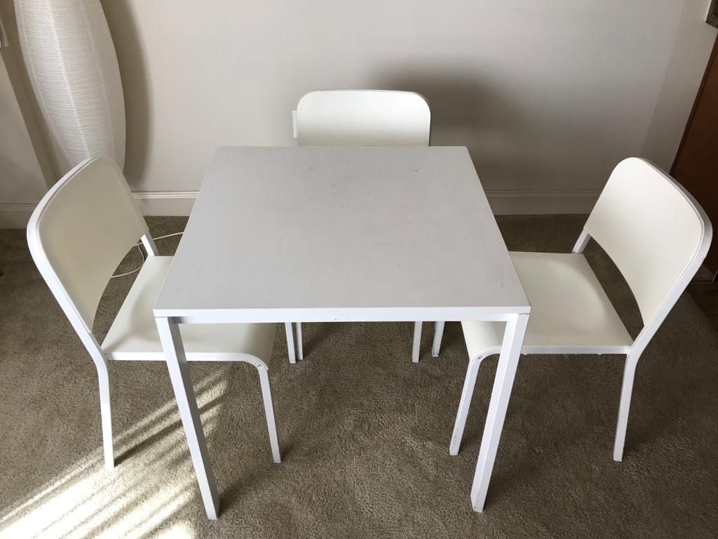 White Square Wooden Table with 3 IKEA Chairs