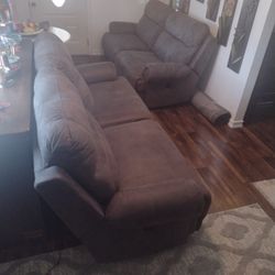 Two Ashley Electric Sofas,Grey color $1,300 or best offer,In excellent Condition . or one For $700. each