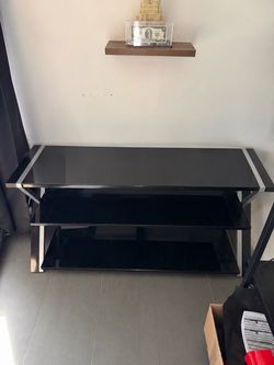 Black glass and chrome TV stand