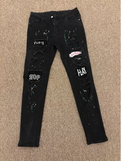 Ripped Paris jeans with designs size 32
