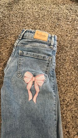 Abercrombie kids jeans with pink bow on pocket size 9/10