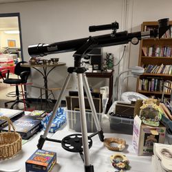 Bushnell telescope model 18-1561,  D=50mm, F=600mm 