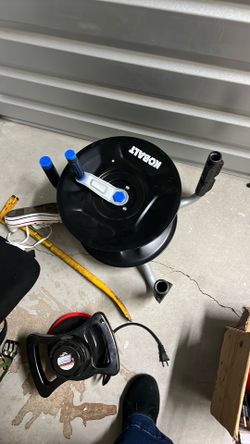 Garden Tool For Your Hose Roll Your Hose Up In It
