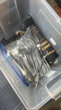 A bunch of forks most unused still in packs come pick today