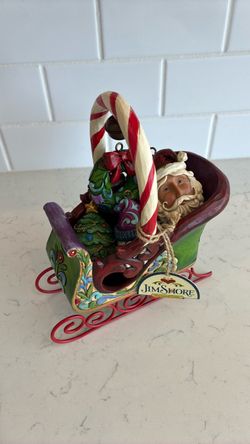 Christmas Jim Shore sleigh with four ornaments