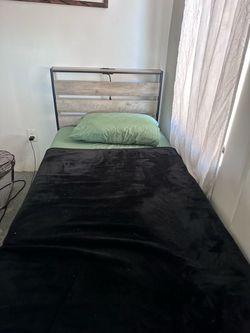Twin size bed with mattress