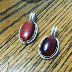 Red tiger eye set in silver 18 each
