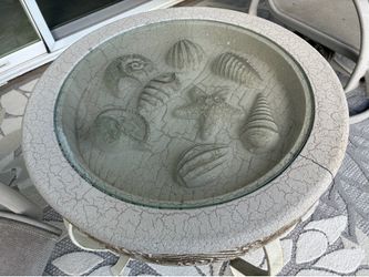 Free sea shell table and 2 swivel chairs
