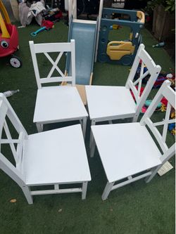 4  white chairs