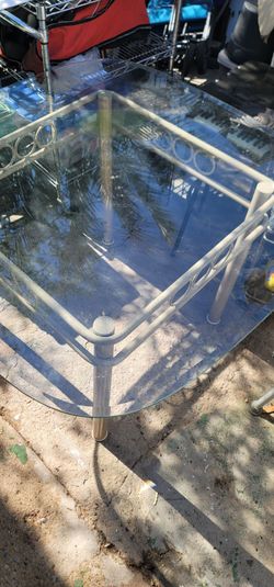 Glass top table with chairs