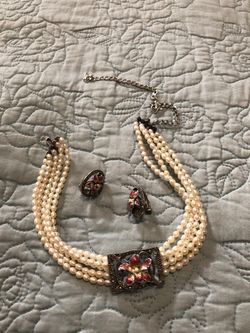 Judithjack choker and clip earring.