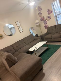 Gray L shaped couch and Love Seat