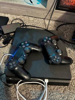 PS4 Slim Console with Two Controllers