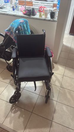New Drive M3 Wheelchair with padded seat and padded armrests