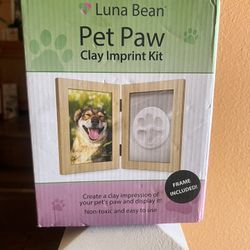 Create a clay impression of your pet's paw with this easy-to-use kit. Includes a frame for display.  Pet Paw Clay Imprint Kit for that special pet. Se