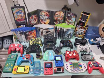 Selling All these games and controllers,  everything for 250. Good condition. 

11 small electronic games...

-red Vintage MGA Super auto racing game 
