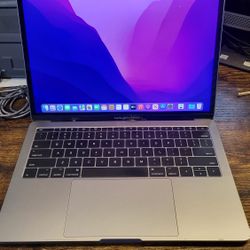 Macbook Pro 13 in retina 2017, i5, 8gb ram, 256gb ssd. Dent at back and cracked on bezel (please see the photo) ,there is a little bit of a difference