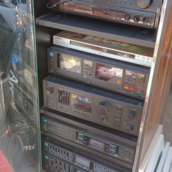 Sansui Pioneer and Sony stereo equipment in stand $250 all