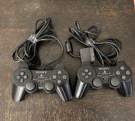 Sony PS2 DualShock 2 Controllers  (needs repair)