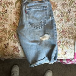 Levi's Faded Blue Denim with Distressed Details