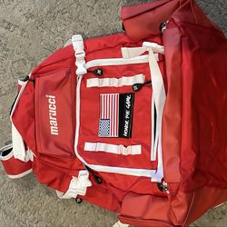 Baseball bat bag (new), pants (M) socks & helmet Marucci)