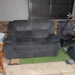 Dual Backed Reclining Loveseat.