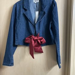 Brand New Size Medium Women’s Denim Jacket w/ Burgandy Tie. Never been worn 