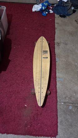 Surf long board w/ wave wheels