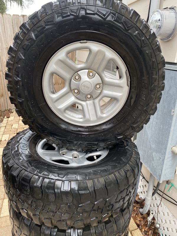 33 inch Jeep tires and rims. Trade? for Sale in Zephyrhills, FL OfferUp