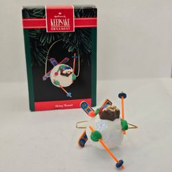Hallmark Ornament Skiing 'Round 1992 Ski Skier Bear Christmas Tree Decoration

Ornament is in excellent condition,  box has some wear due to storage a