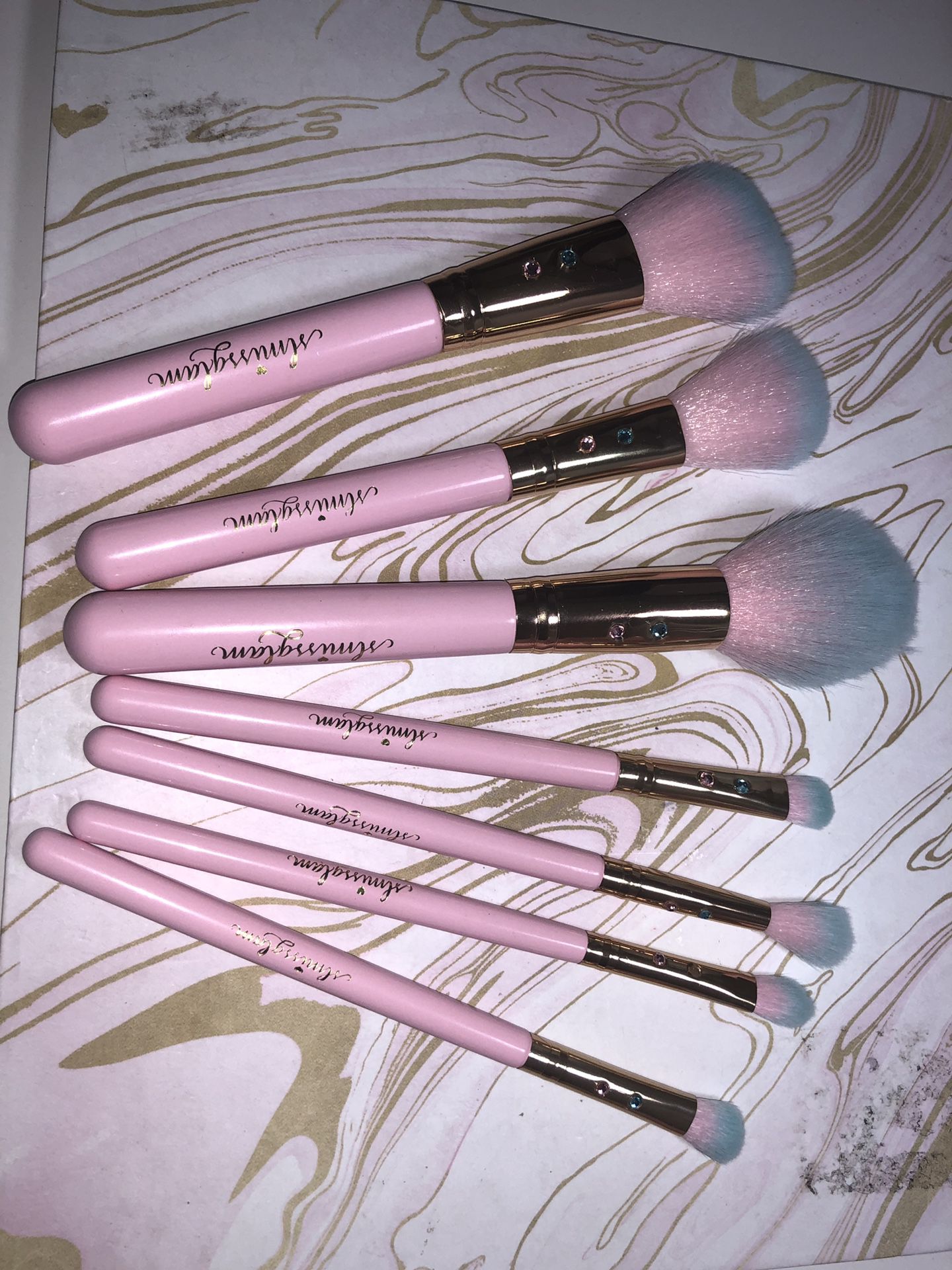 Makeup Brushes, Brand new, never used, open package to take pictures.Pink and blue price $35.00 Each set, I have 2 sets. Gold and Pink Set $25.00 the