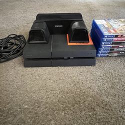 PS4 With Charging Stand & Games 