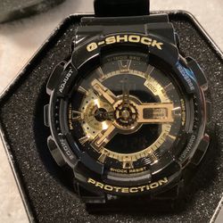 Black And Gold G Shock Watch