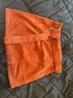 Woman orange skirt