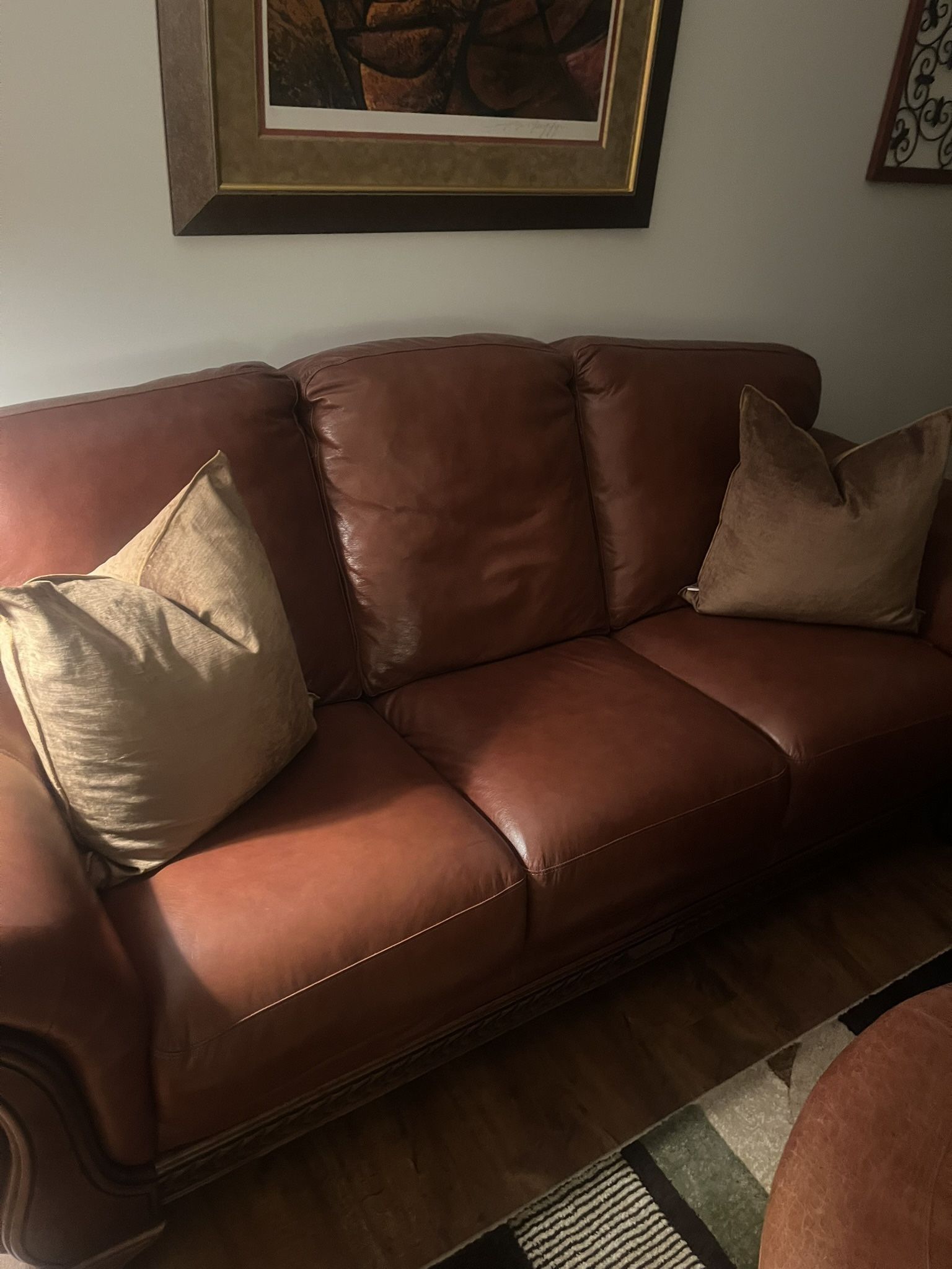 Ready to pickup. Traditional two piece living room set.  Sofa and Loveseat.