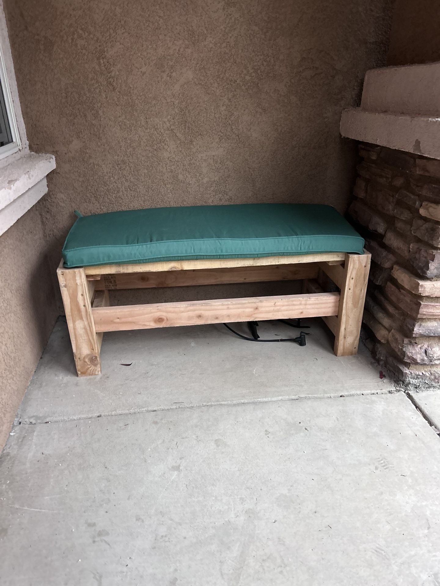 Wood Bench With Green Cushion