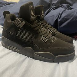 Black Cat Jordan 4s 