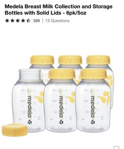 Medela Breast Milk Containers And Storage Bottles With solid lids