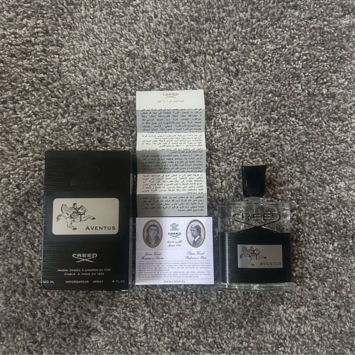 Creed Aventus Fragrance with Black and Silver Accents