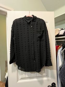 Black long sleeve blouse with front pocket